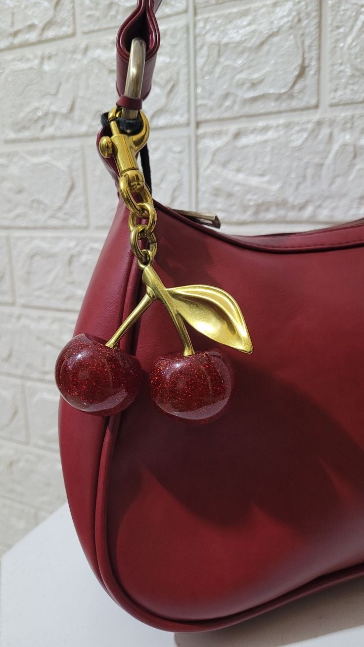 Coach cherry bag charm