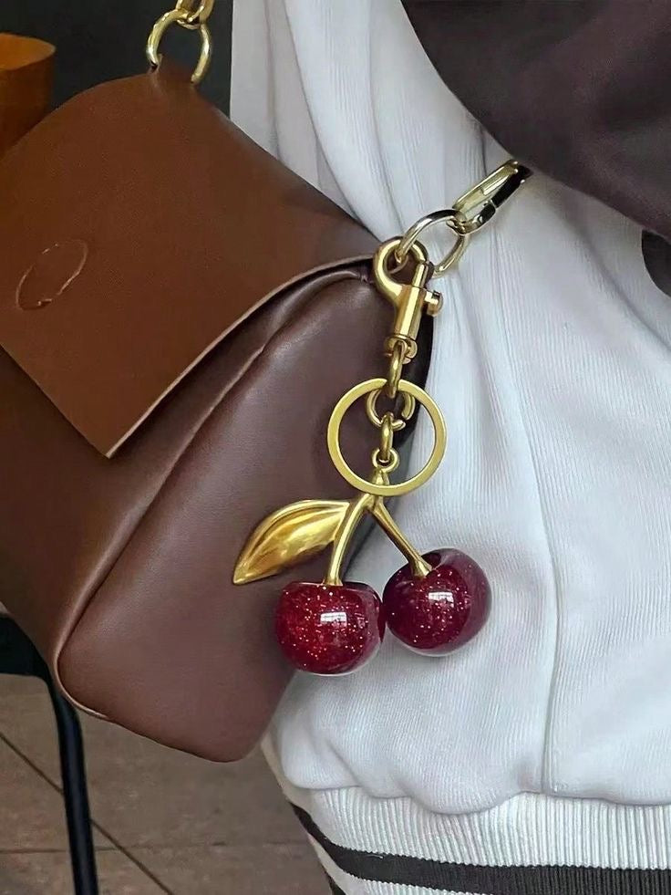 Coach cherry bag charm