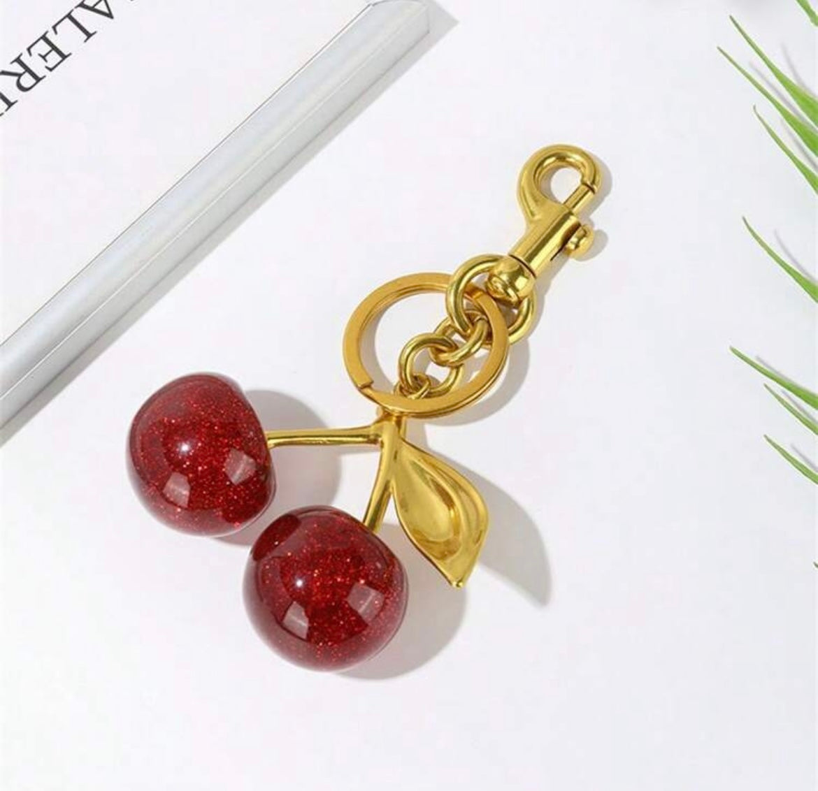 Coach cherry bag charm